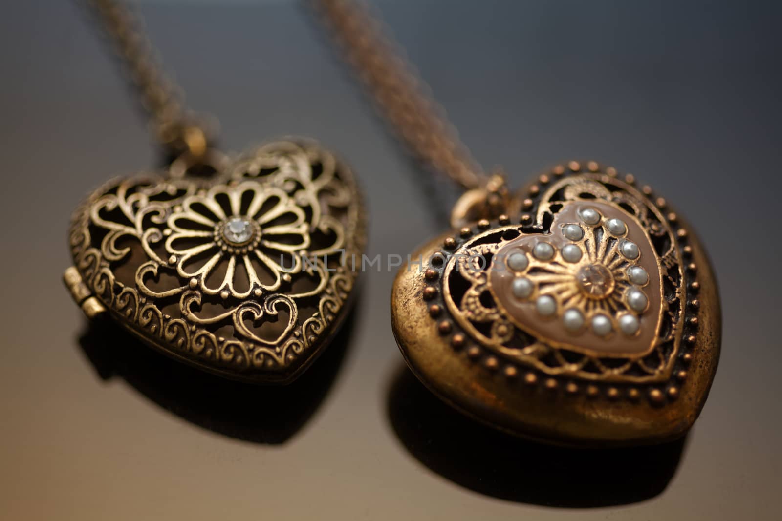 Heart-shaped necklace on black background