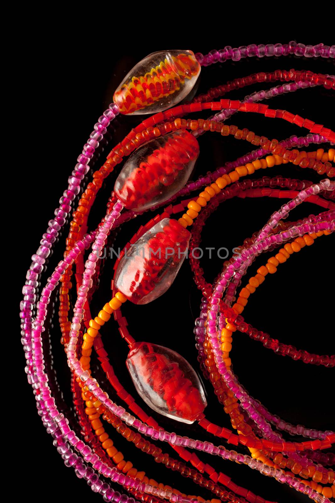 Jewelry of beads on black background