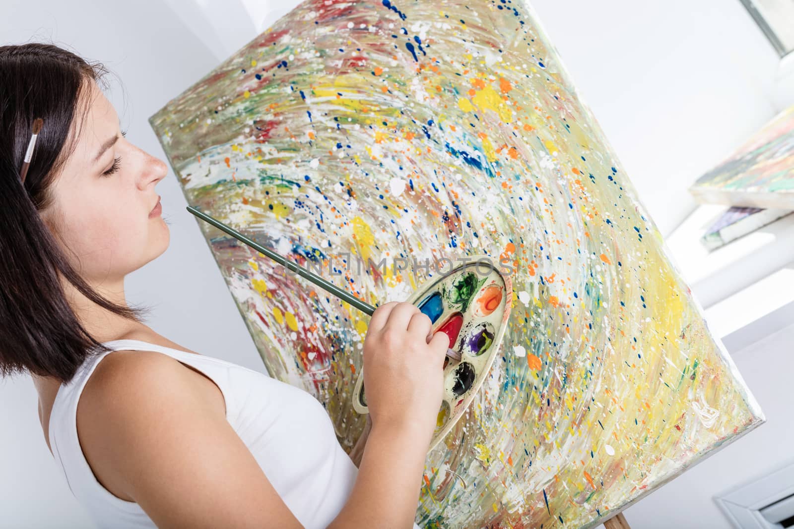 woman with an easel paints a picture by MegaArt