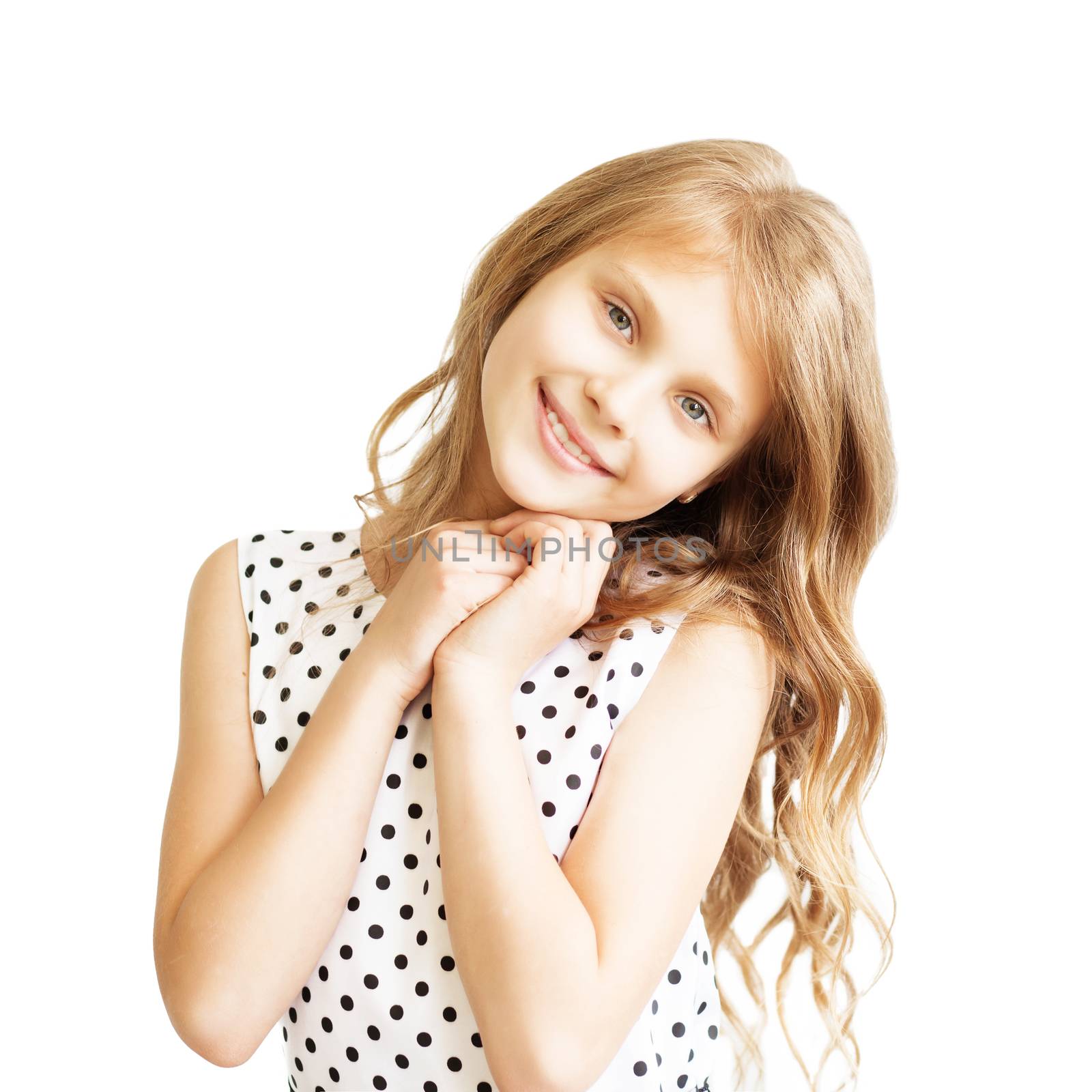 Closeup portrait of a lovely little girl isolated on white background