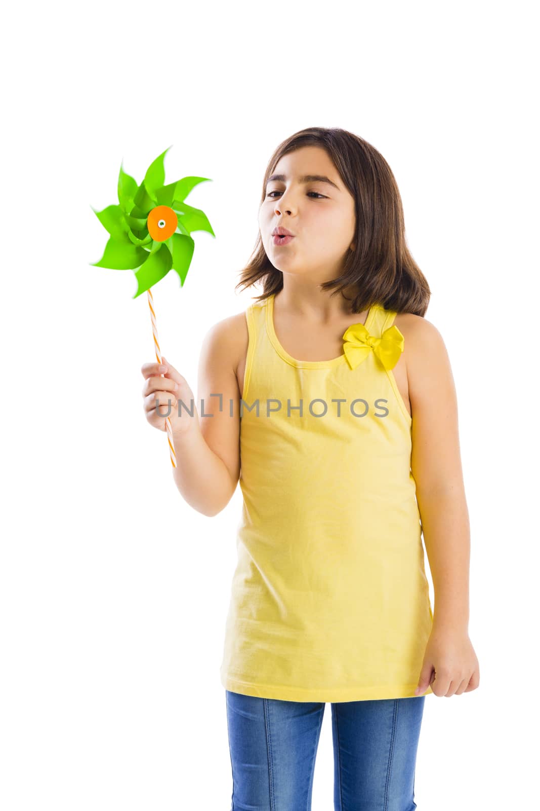 Girl blowing a windmill by Iko