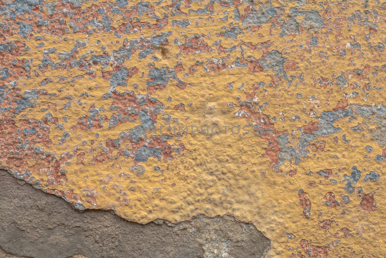 fragment of a concrete wall that for a long time exposed to different climatic conditions