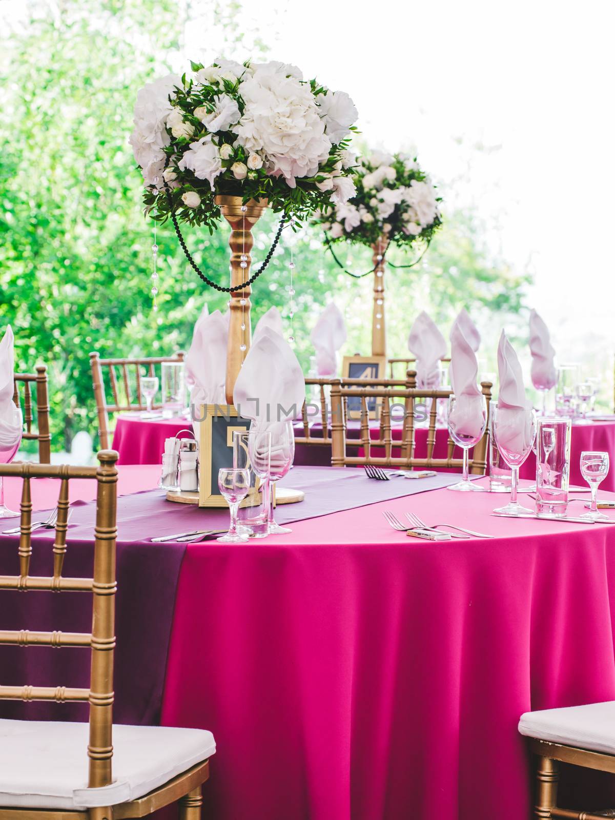 Beautiful dinner wedding table setting, summer outdoor