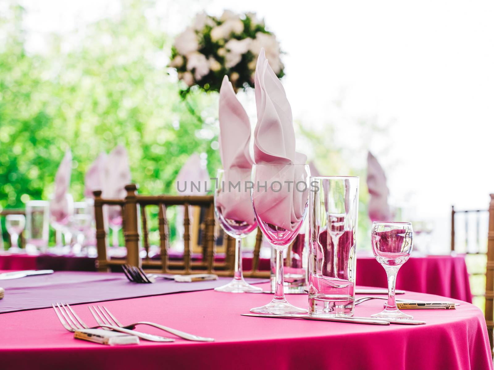 Beautiful dinner wedding table setting, summer outdoor