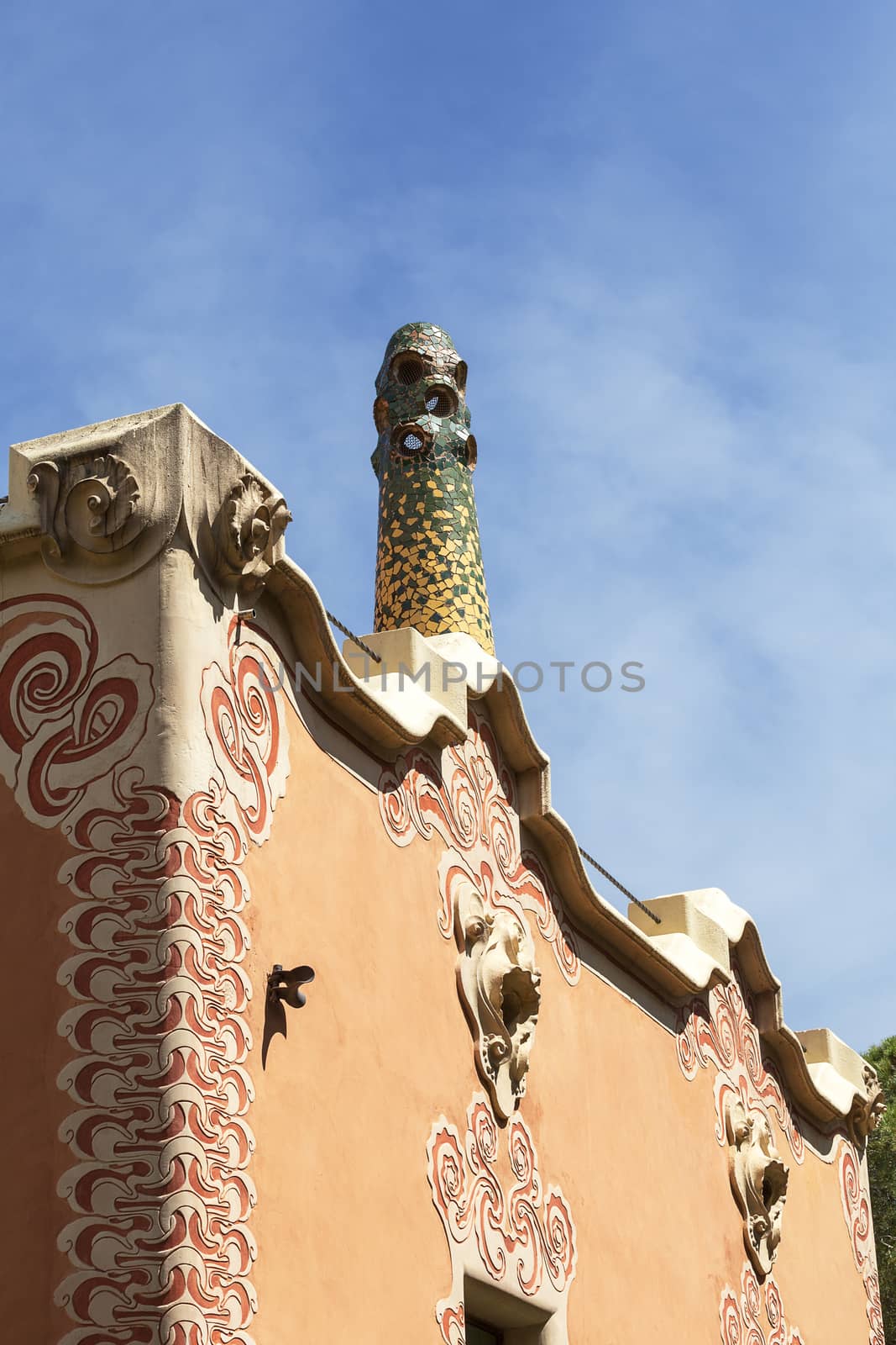 Decorative facade  on Gaudi House Museum with mosaic chimney, Barcelona, Spain by mychadre77