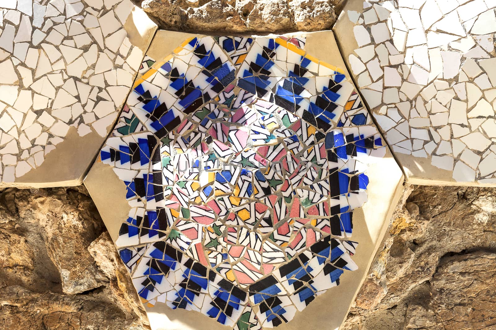 BARCELONA , SPAIN - MAY 13, 2016 : Mosaic in the garden of Gaudi House Museum. Building  located near the Park Guell  in Barcelona was the residence of Antoni Gaudi for almost 20 years, from 1906 to 1925.