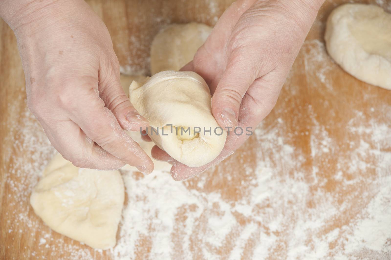 Several small patties with the potato filling