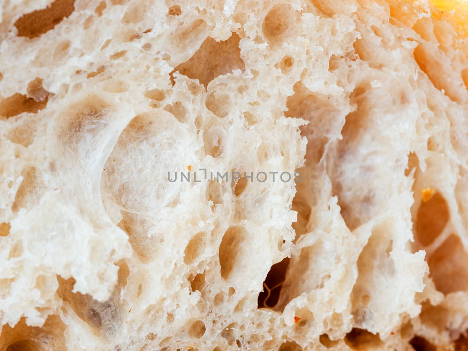 close up shot of white sourdough bread slice. Macro of bread slice texture. Tasty fresh bread, close up for background