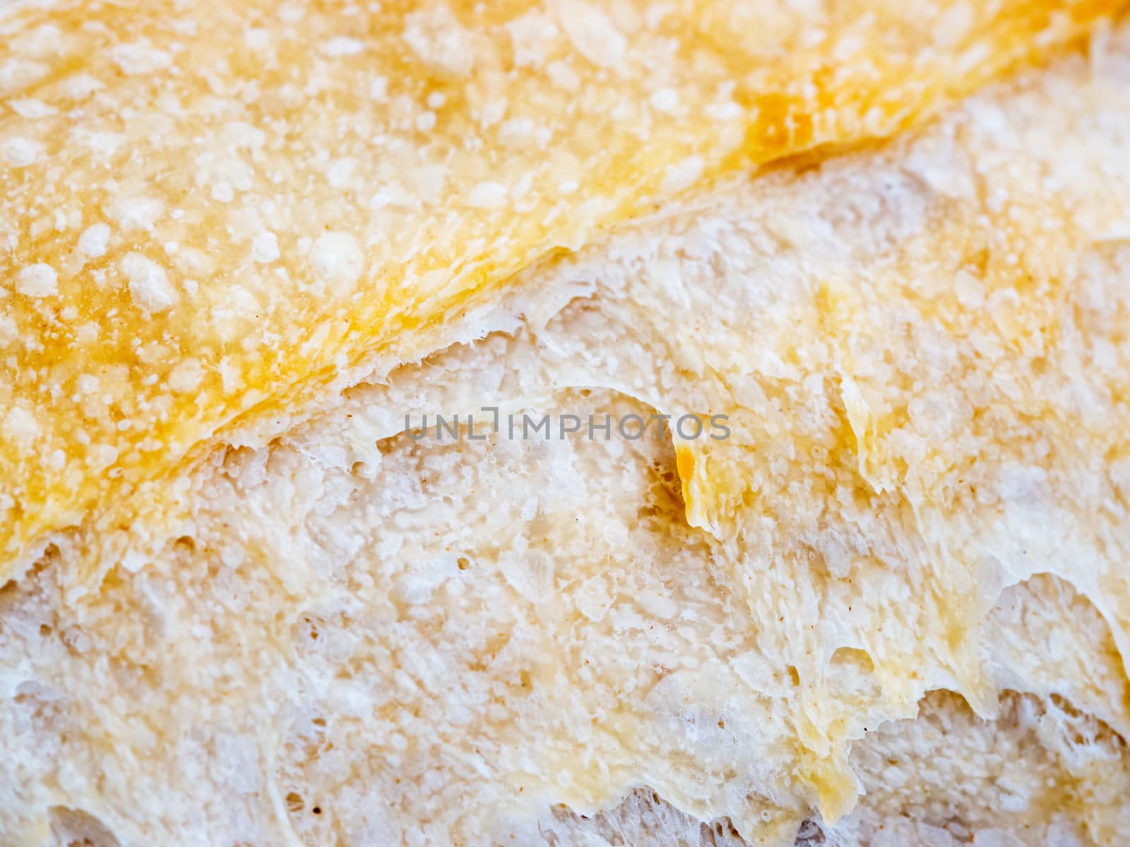 Macro of sourdough bread crust texture. Tasty fresh sourdough bread, close up for background