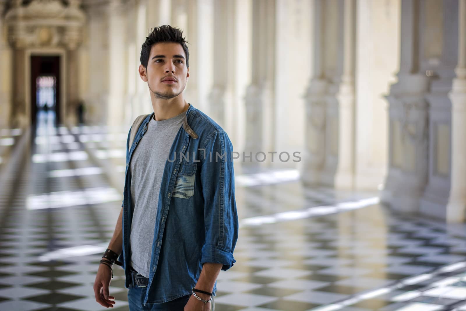 Handsome Young Man Inside a Museum by artofphoto
