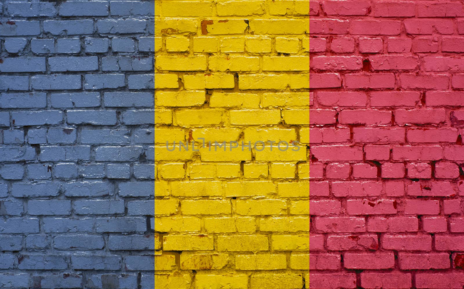 Chad flag painted on old brick wall