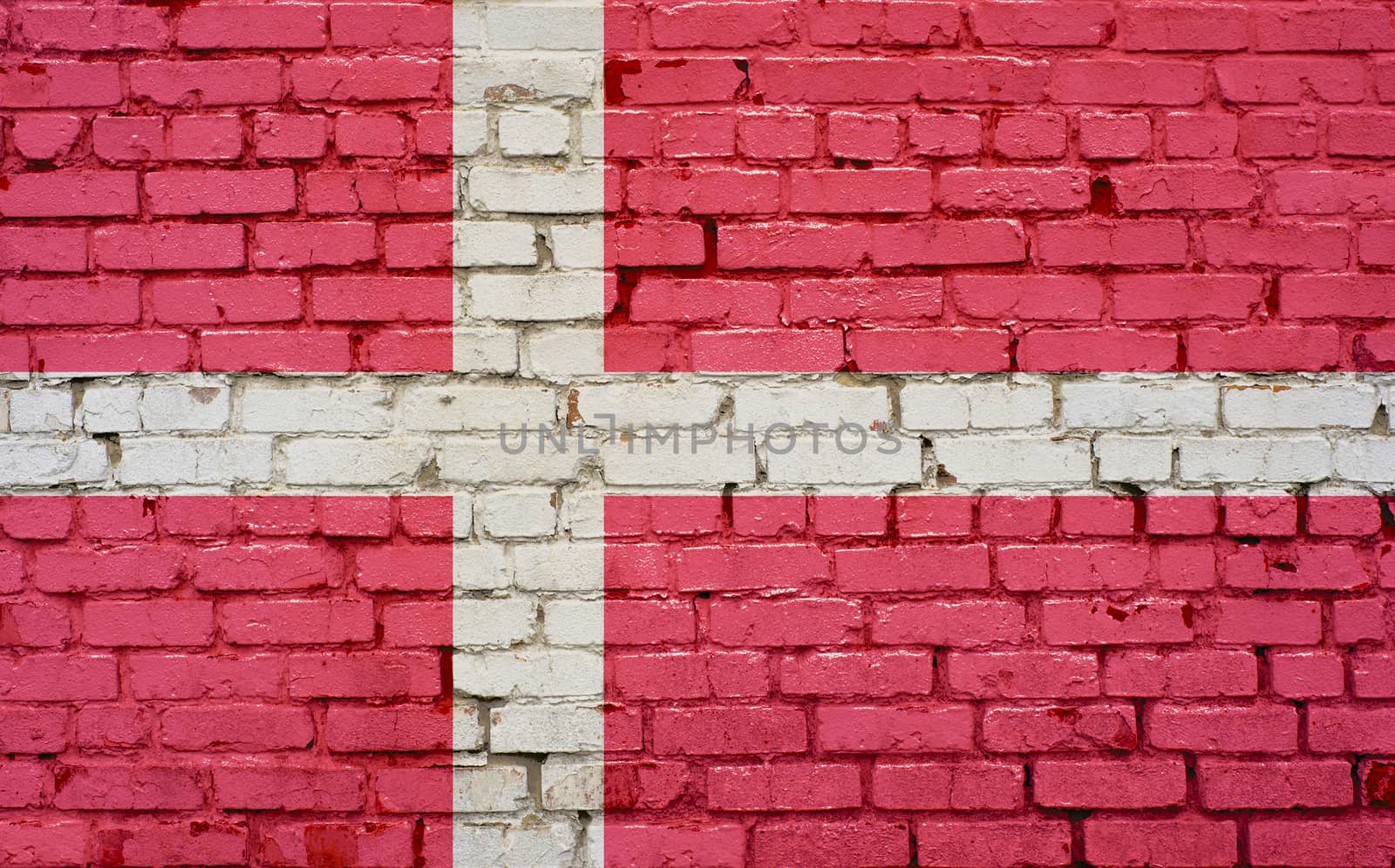 Flag of Denmark painted on brick wall, background texture