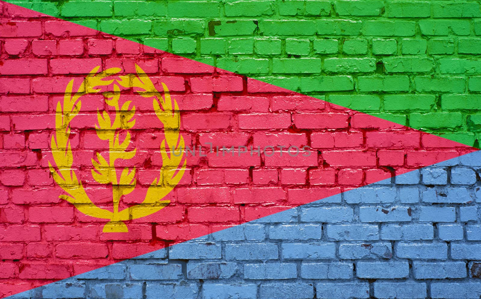 Flag of Eritrea painted on brick wall, background texture