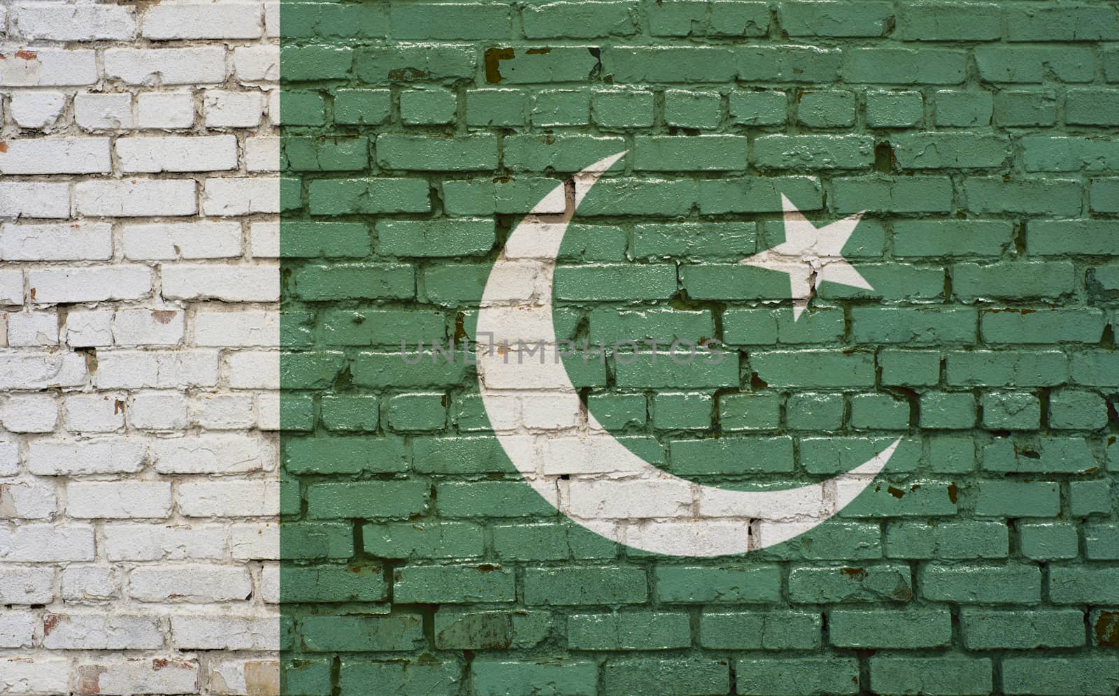 Flag of Pakistan painted on brick wall, background texture