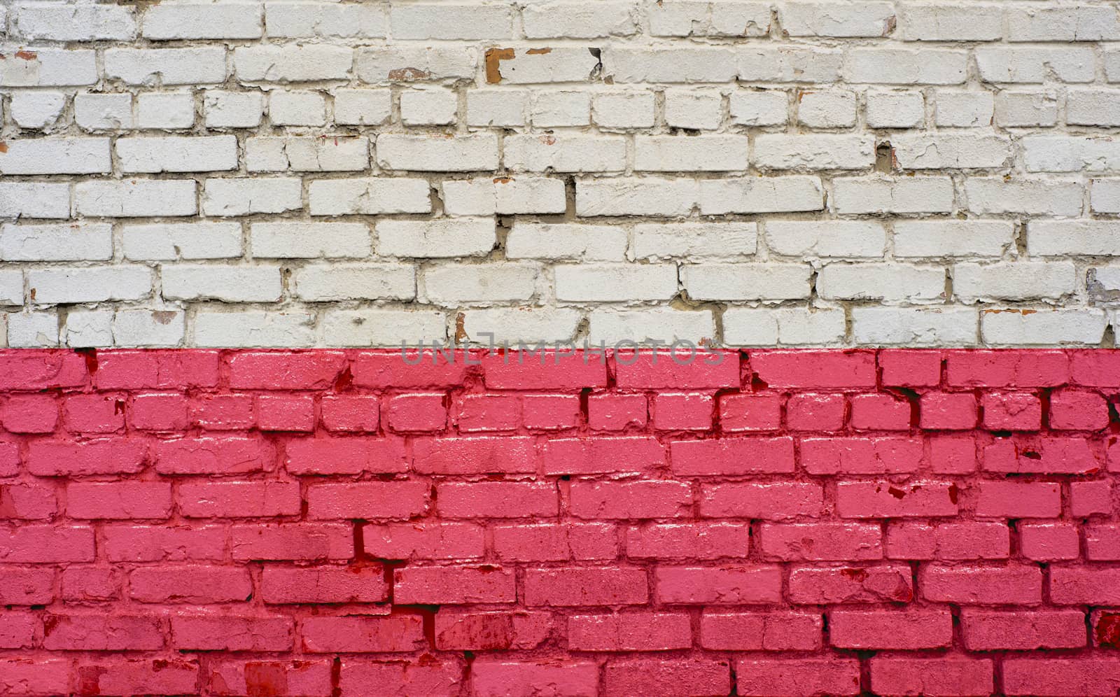 Flag of Poland painted on brick wall, background texture