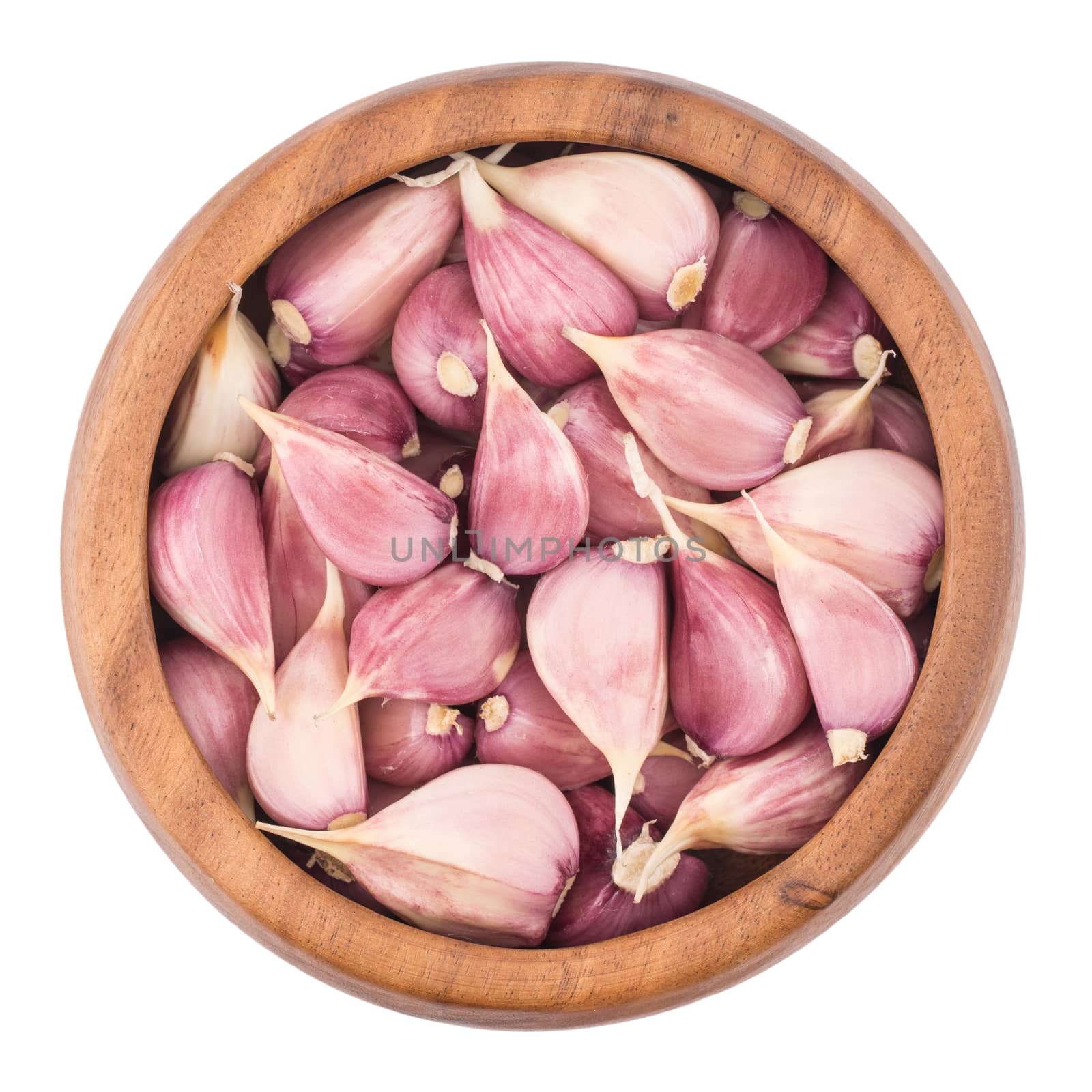 Garlic on wooden bowl top view of white background