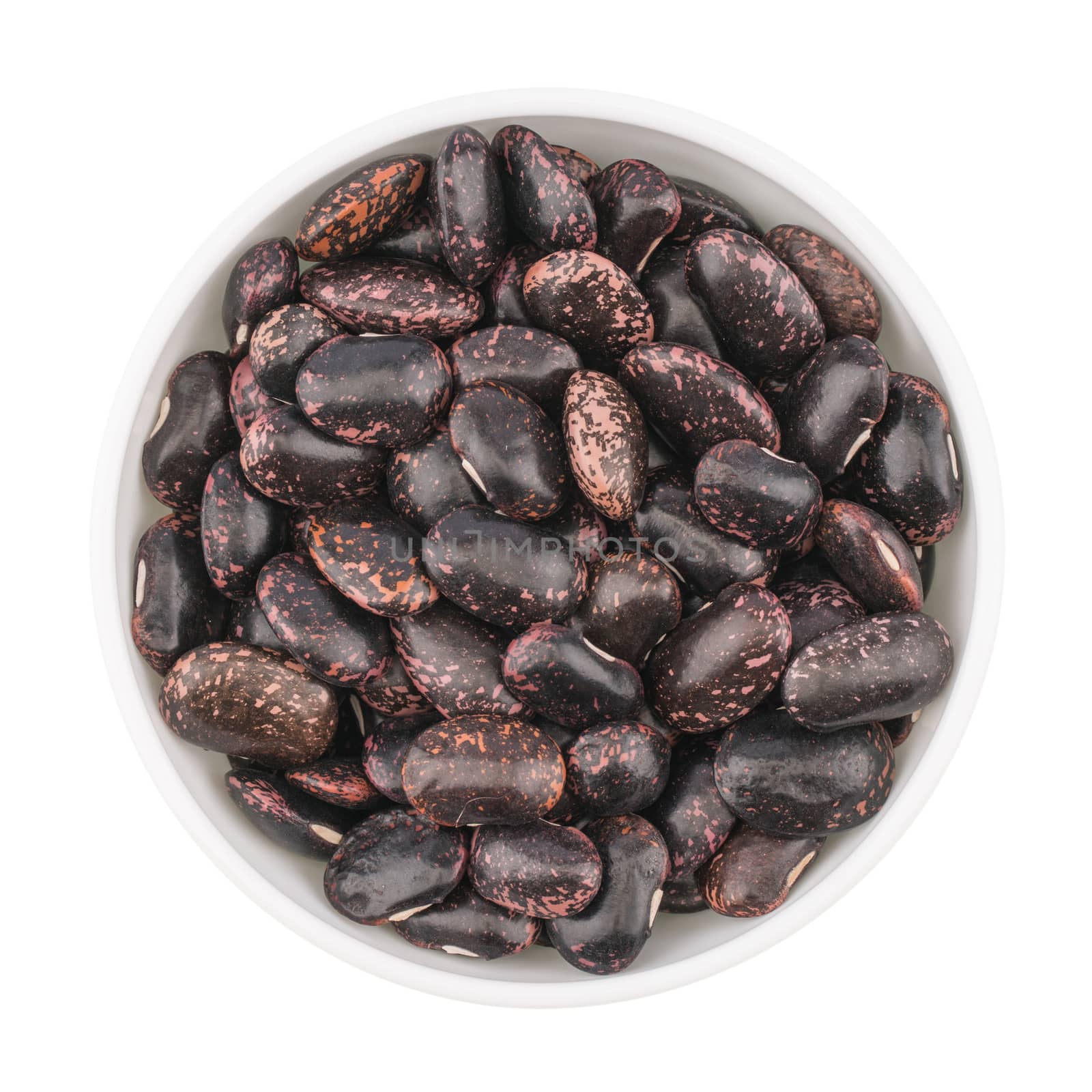 dried beans in bowl on white background