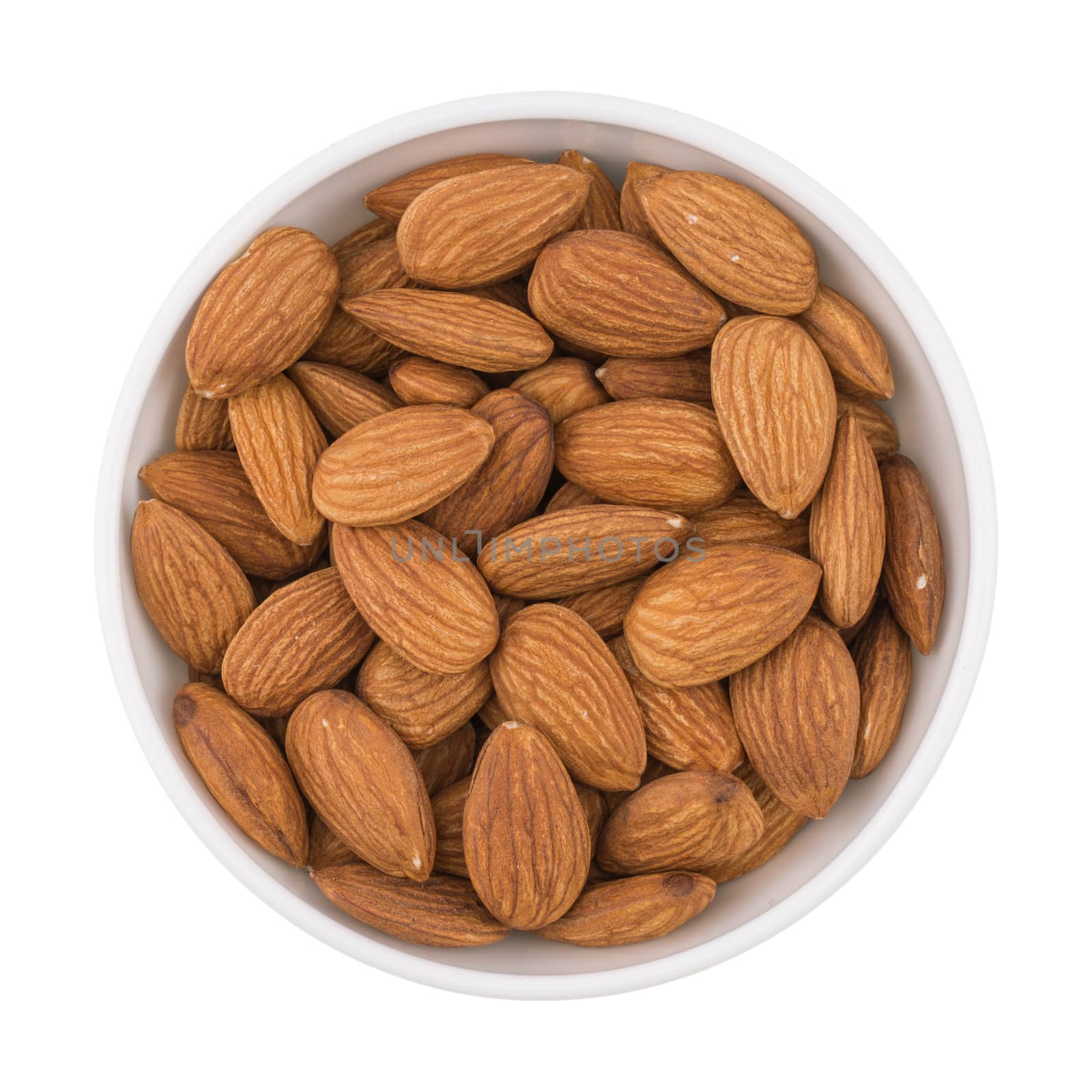 Almonds seed in the bowl isolated on white background.