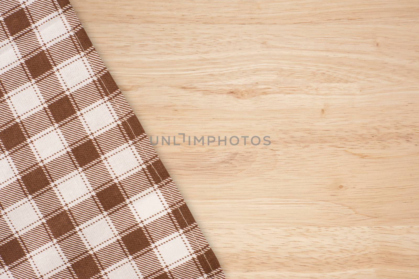 Checkered Tablecloth On The Wooden Background