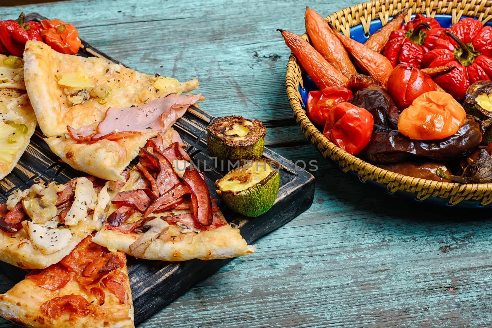 Pizza stuffed with meat and baked vegetables in rustic style