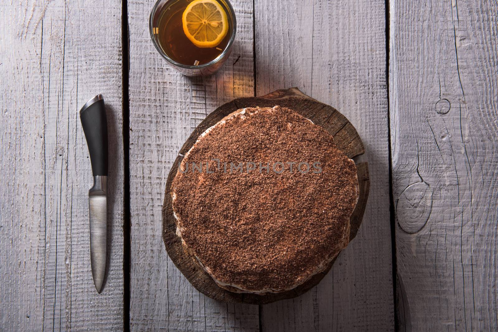 homemade nut cake in a tree with lemon tea