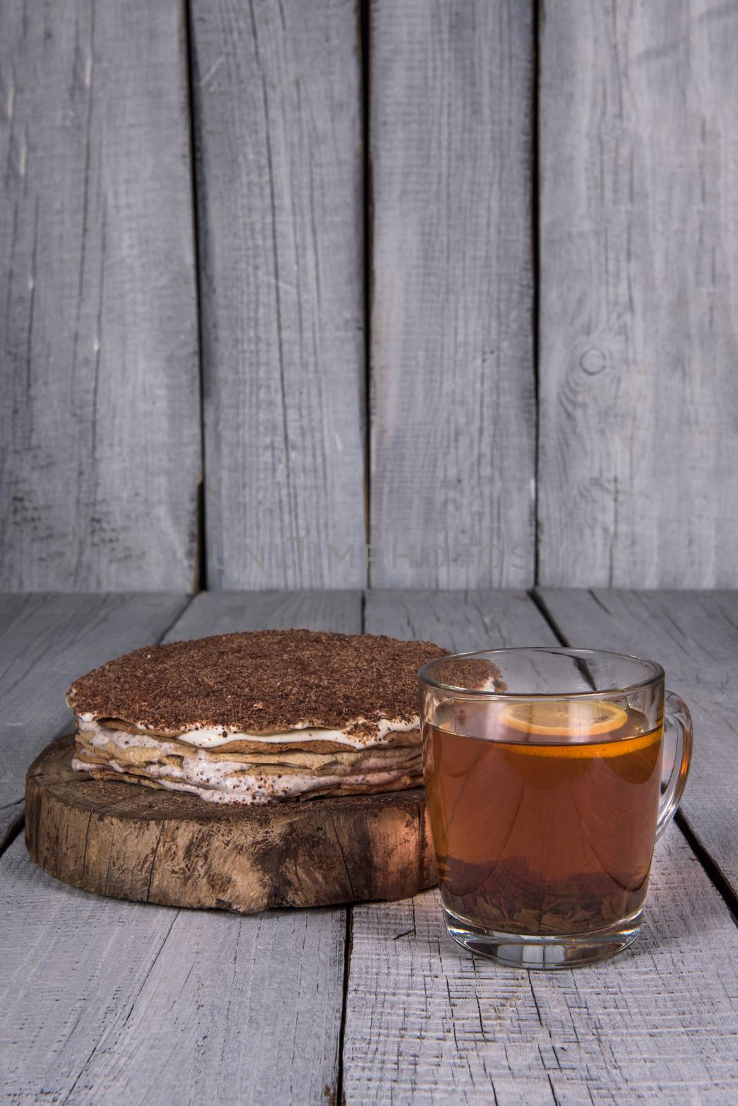 homemade nut cake in a tree with lemon tea