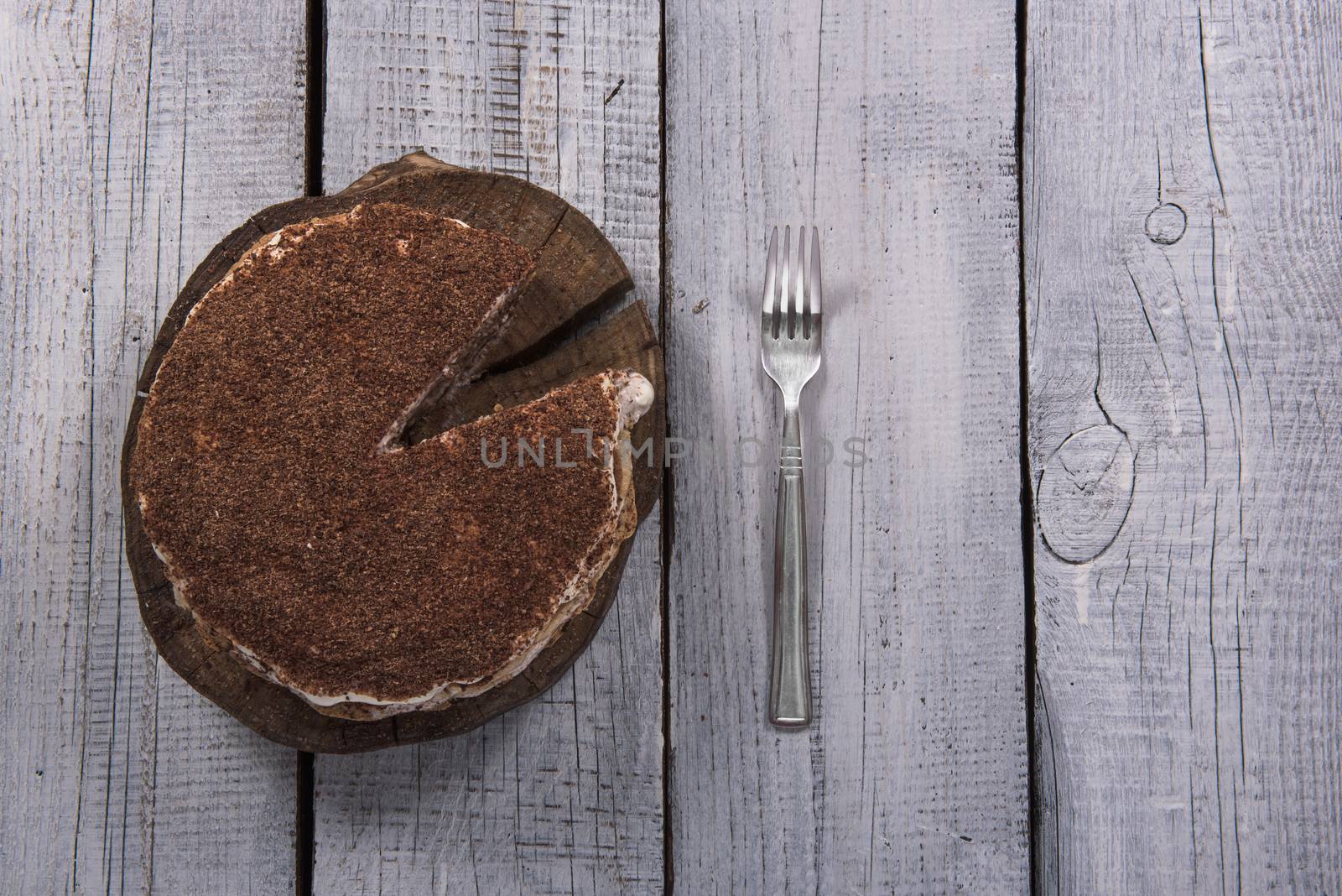 homemade nut cake in a tree with lemon tea