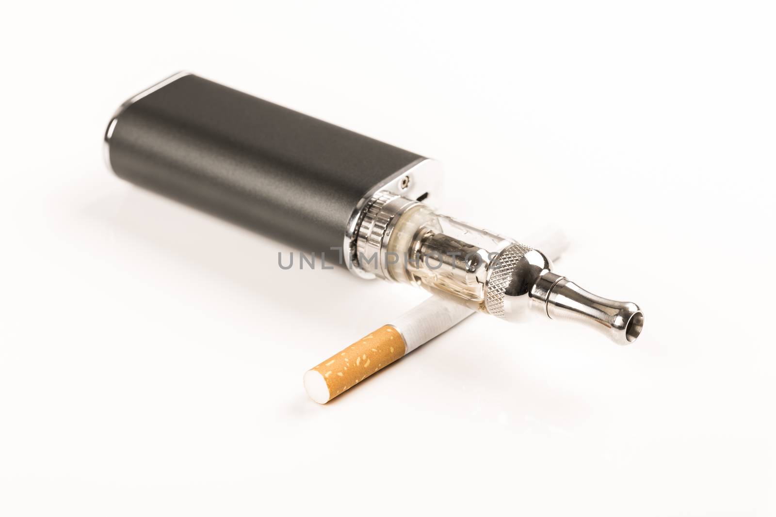 electronic cigarettes and tabacco on white background stop smoking message