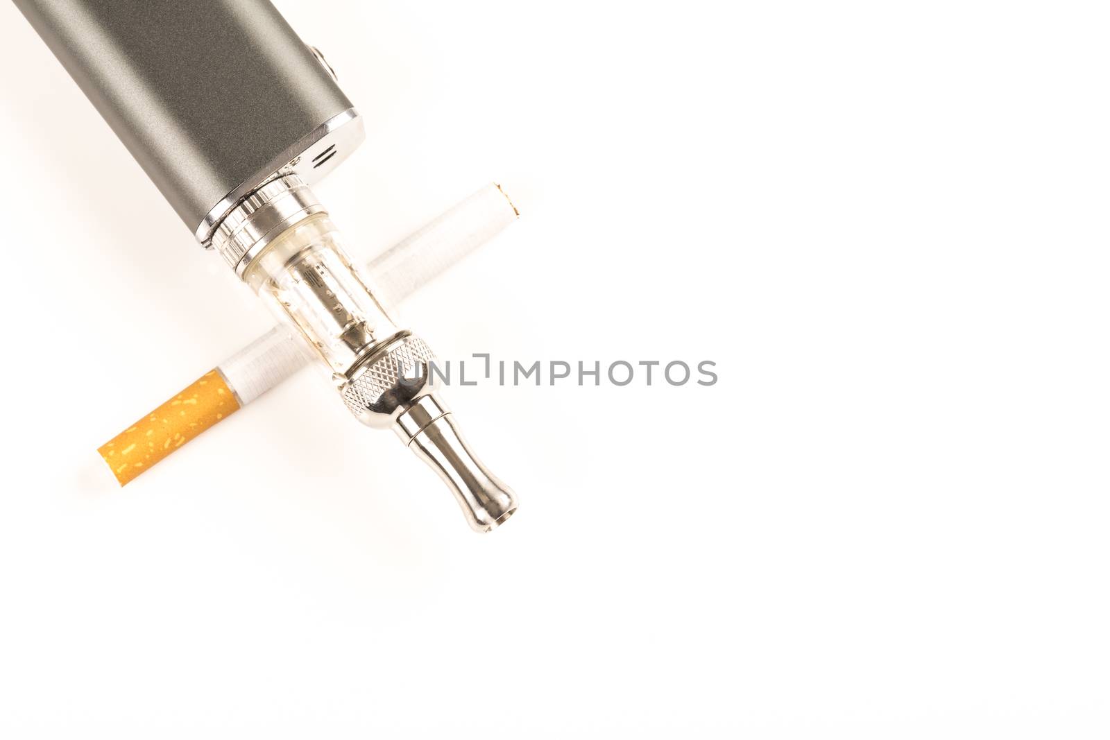 electronic cigarettes and tabacco on white background stop smoking message