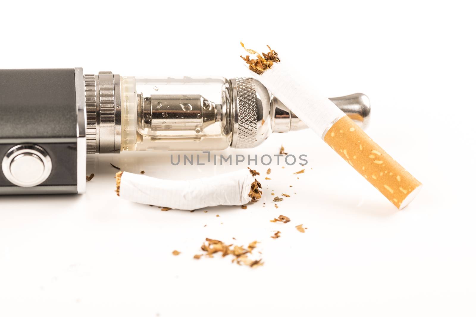 electronic cigarettes and tabacco on white background stop smoking message