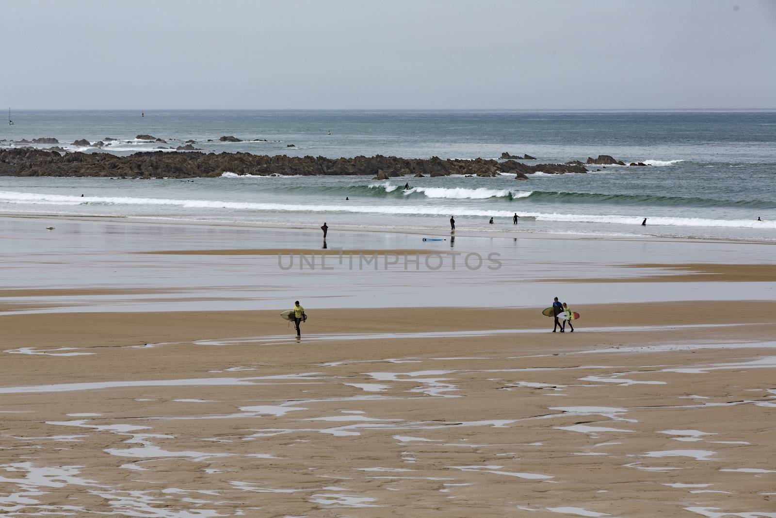 beach coastline sun sand ocean walk people France Normandy Hague