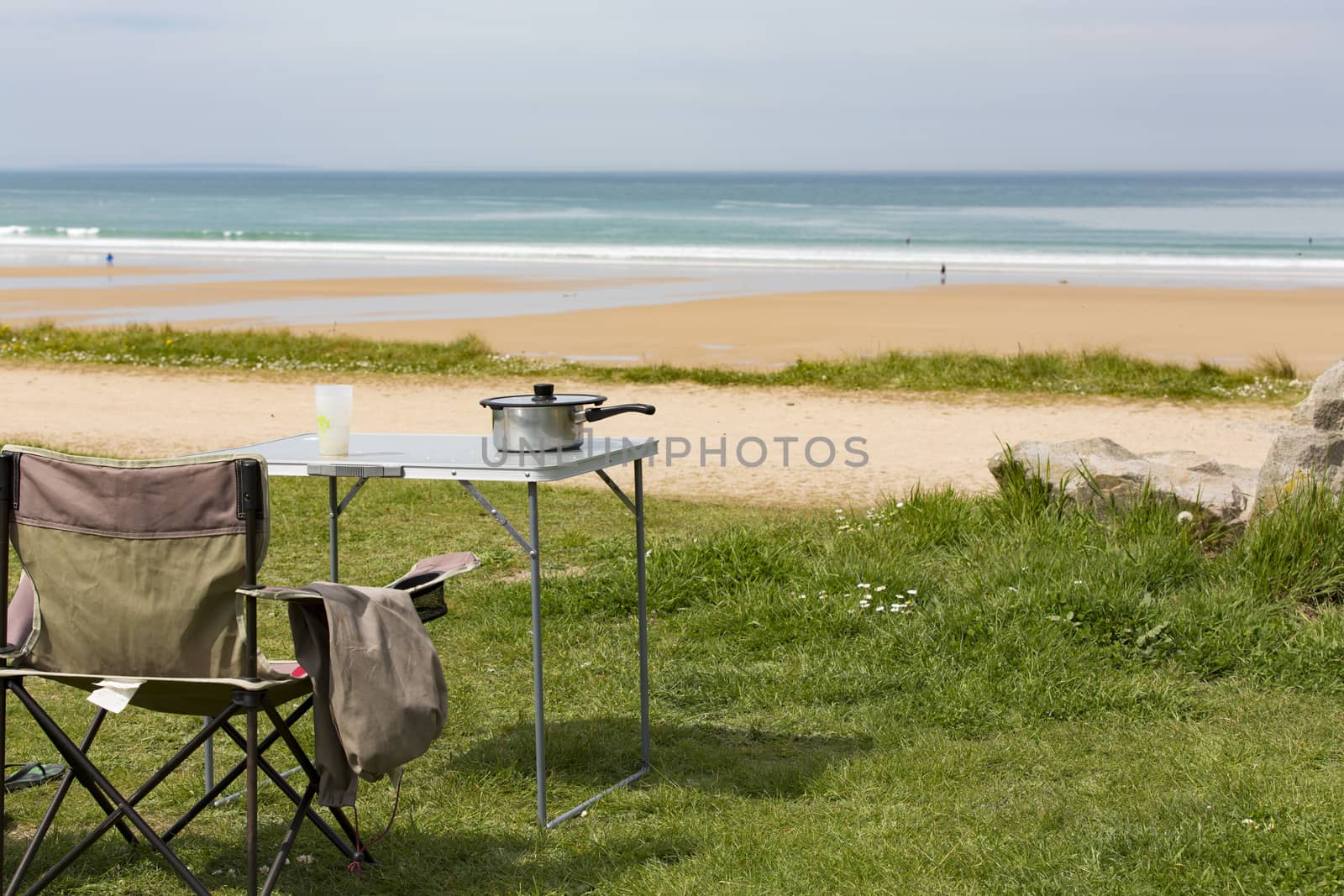 Picnic table lunch on grass sea view nobody France Normandy