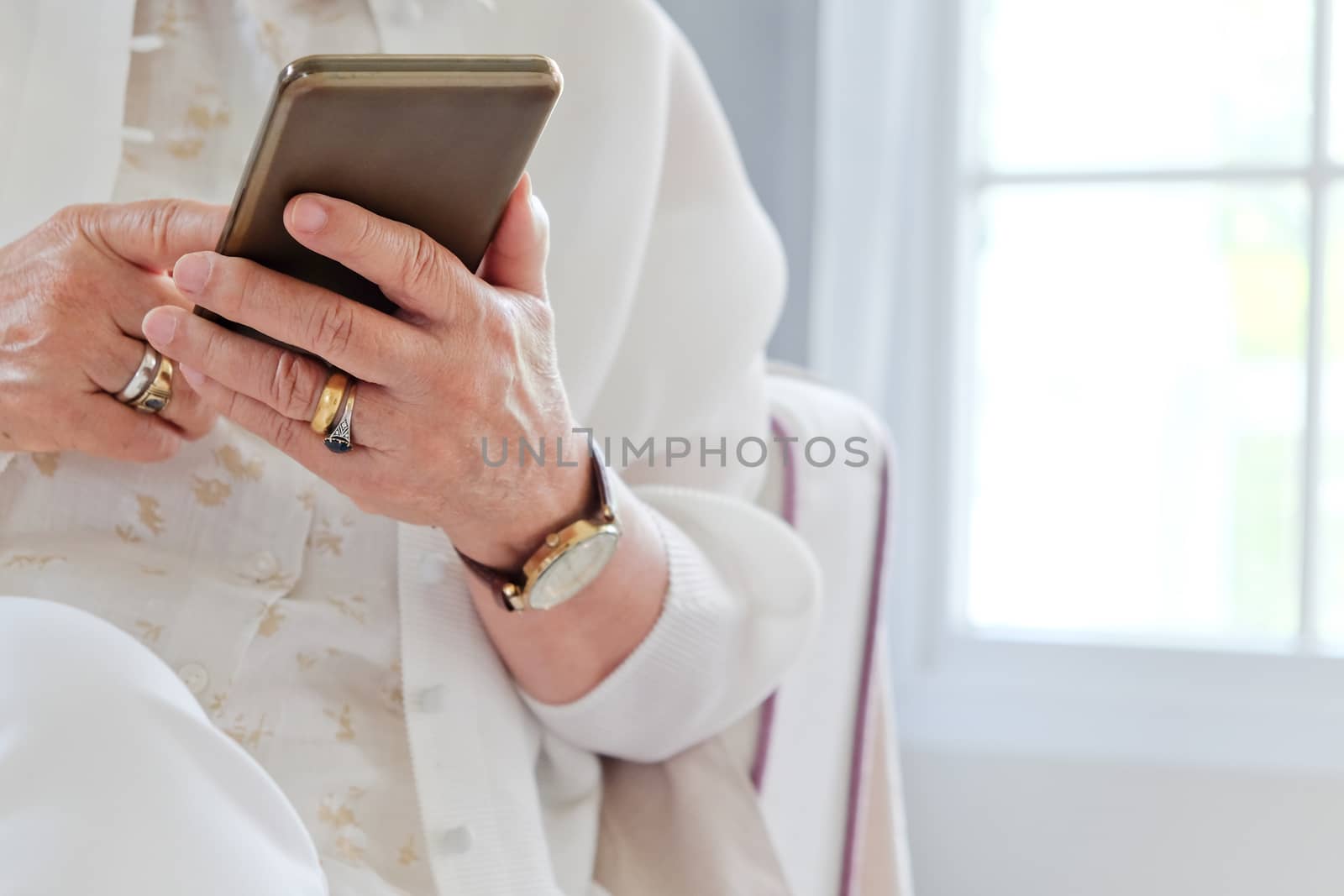 Senior woman using her mobile phone.