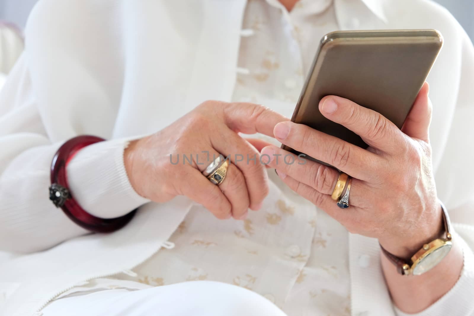 Senior woman using her mobile phone.