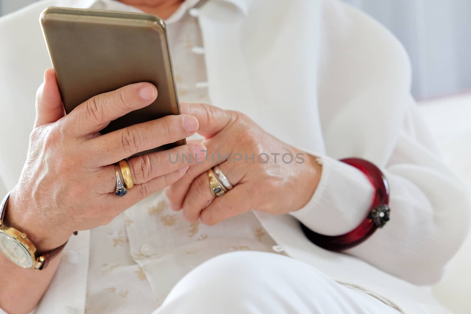 Senior woman using her mobile phone.