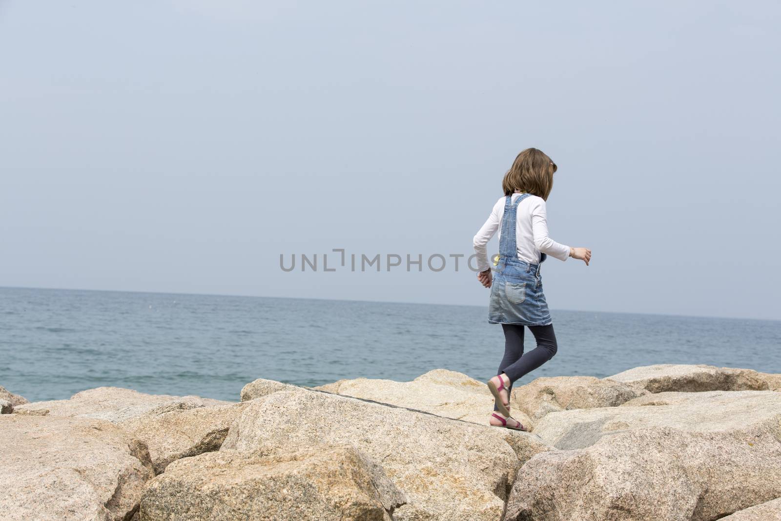 little girl near the sea by CatherineL-Prod