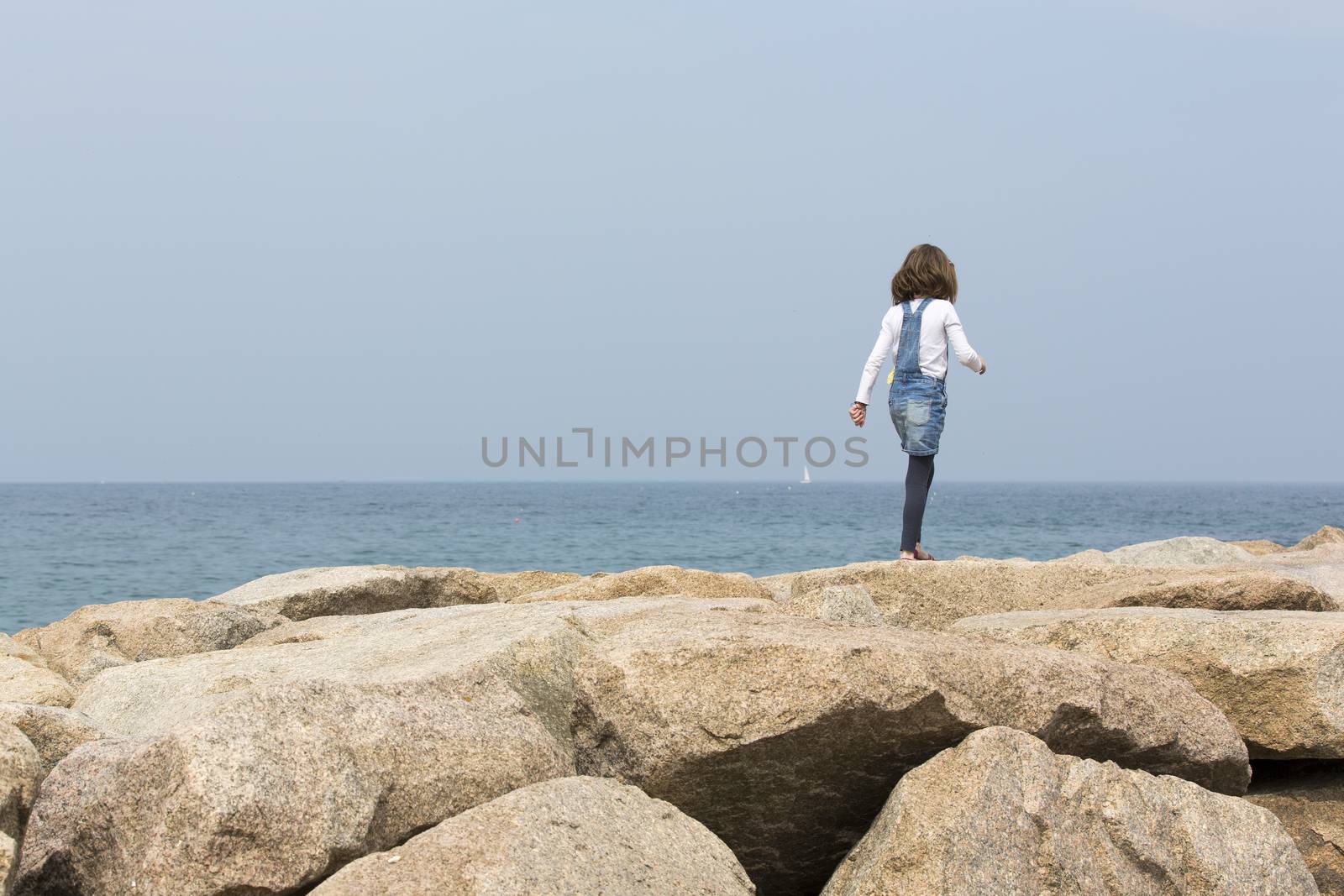 little girl near the sea by CatherineL-Prod