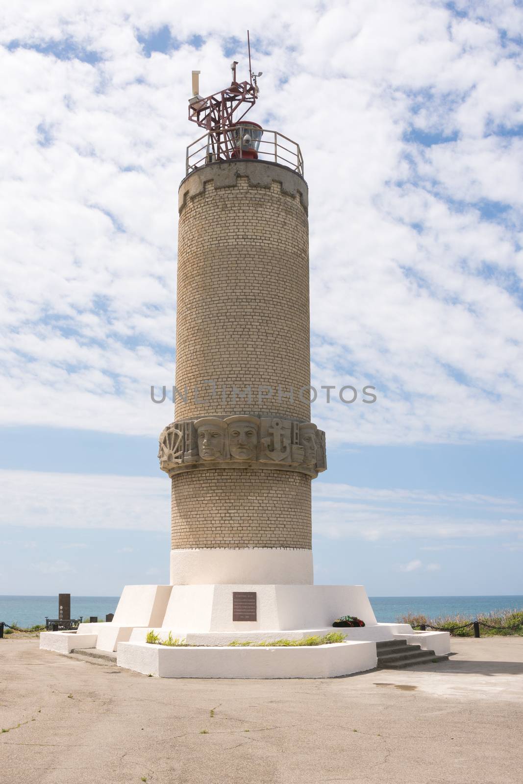 Big Utrish, Russia - May 17, 2016: Monument to the lighthouse on the island of Utrish, built in 1975 in tribute to all sailors of the Azov-Black Sea fleet, as well as the crew of the vehicle "Fabricius" vessel and training "Dnepr" vessel, which in the Great Patriotic War it was torpedoed by the Germans