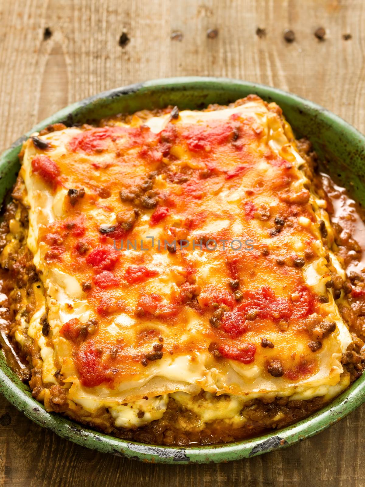 close up of rustic italian cheesy lasagna pasta