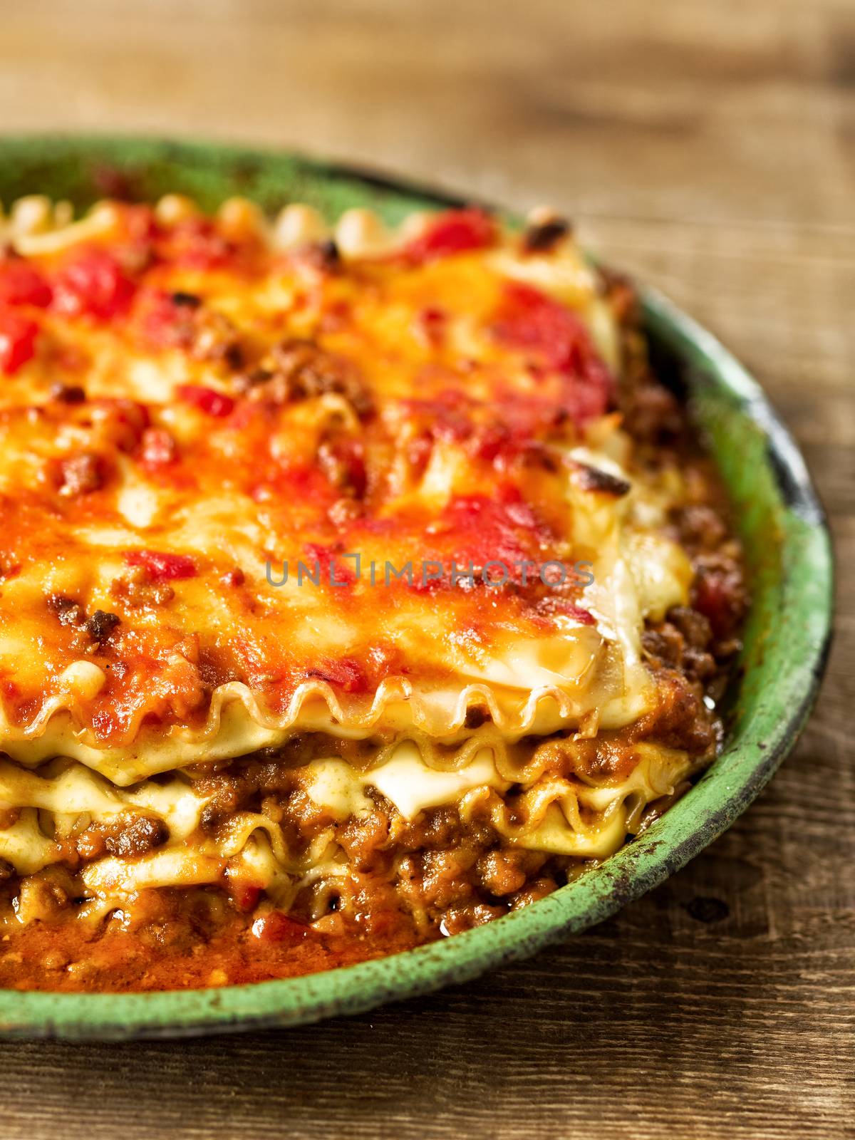 close up of rustic italian cheesy lasagna pasta