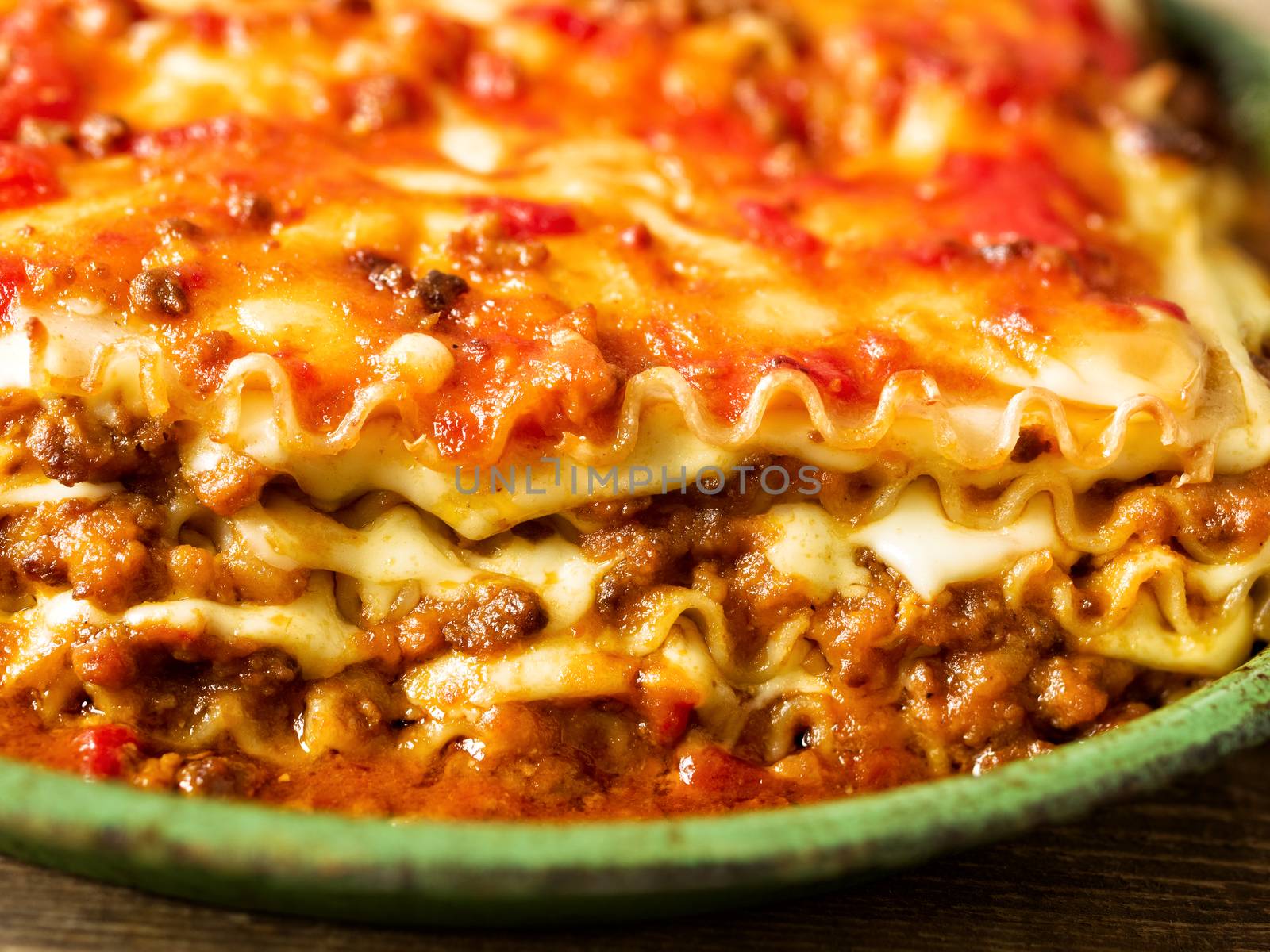 close up of rustic italian cheesy lasagna pasta