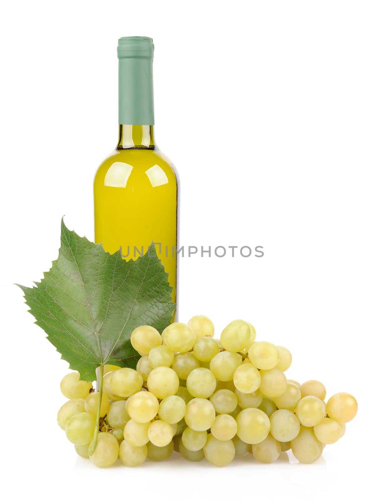 White wine bottle and grapes isolated on white background