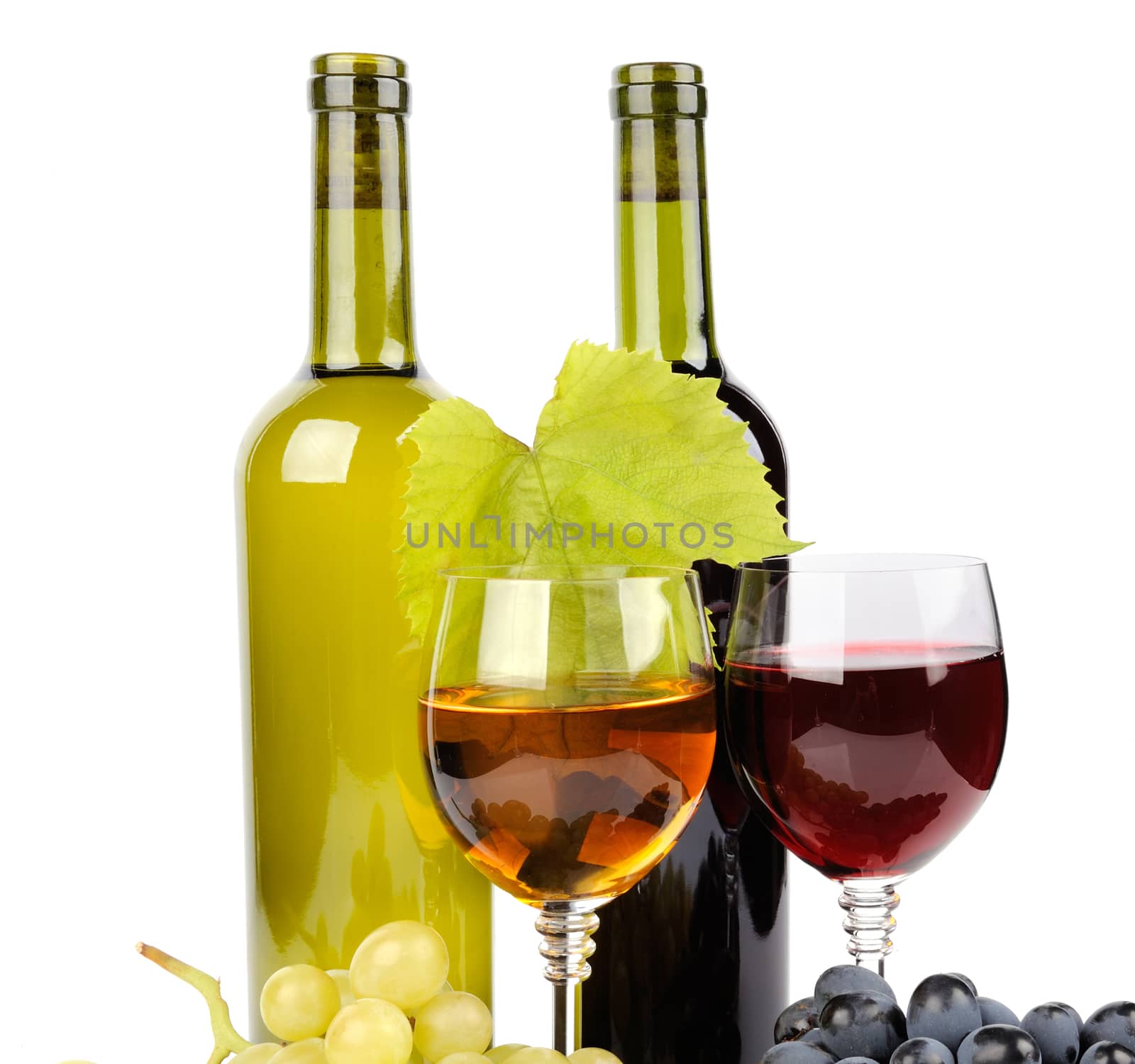 Wine bottle, glass and grapes isolated on white background