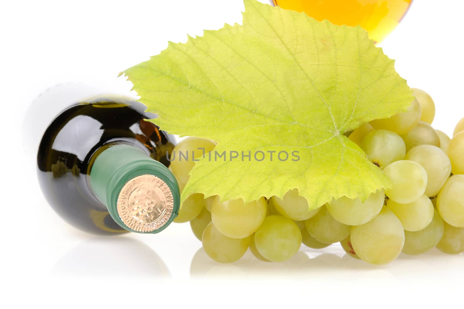 Wine bottle, glass and grapes isolated on white background