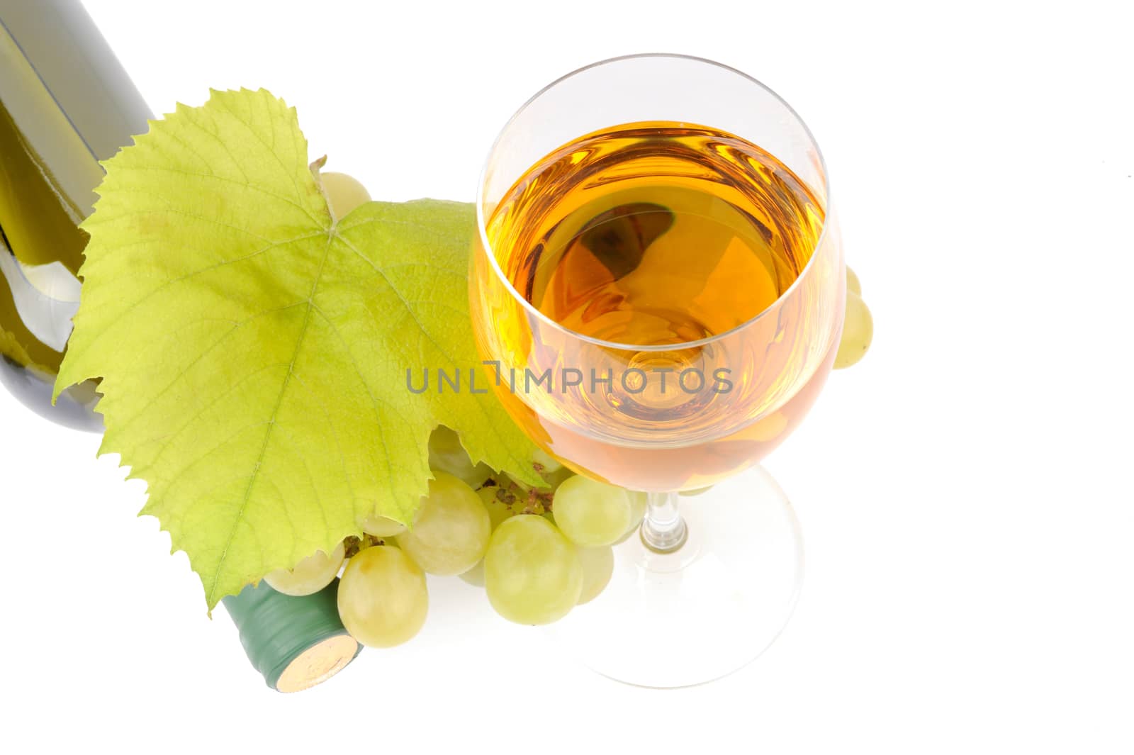 Wine bottle, glass and grapes isolated on white background