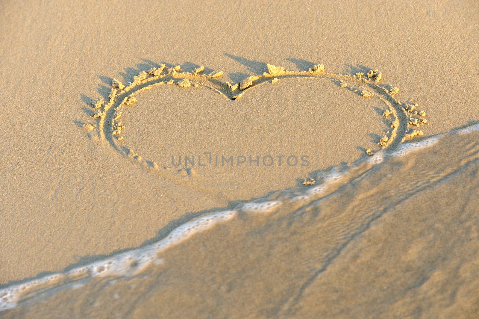 Heart in sand on a beach