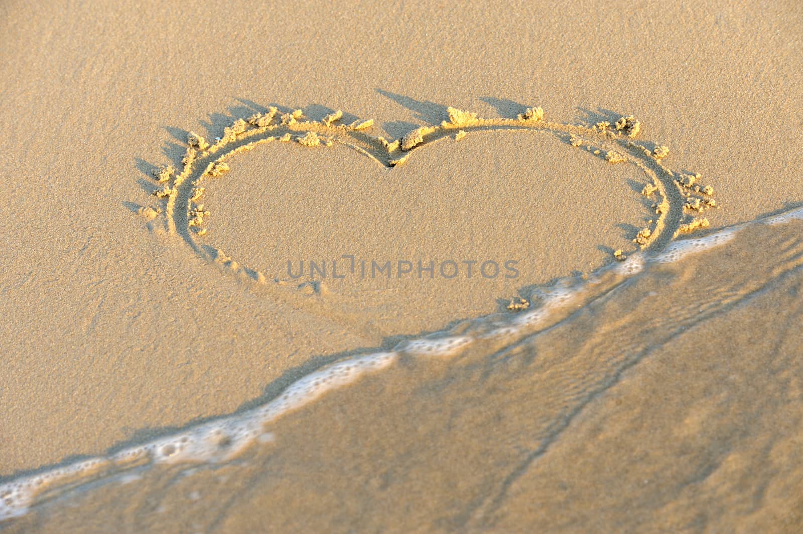 Heart in sand on a beach