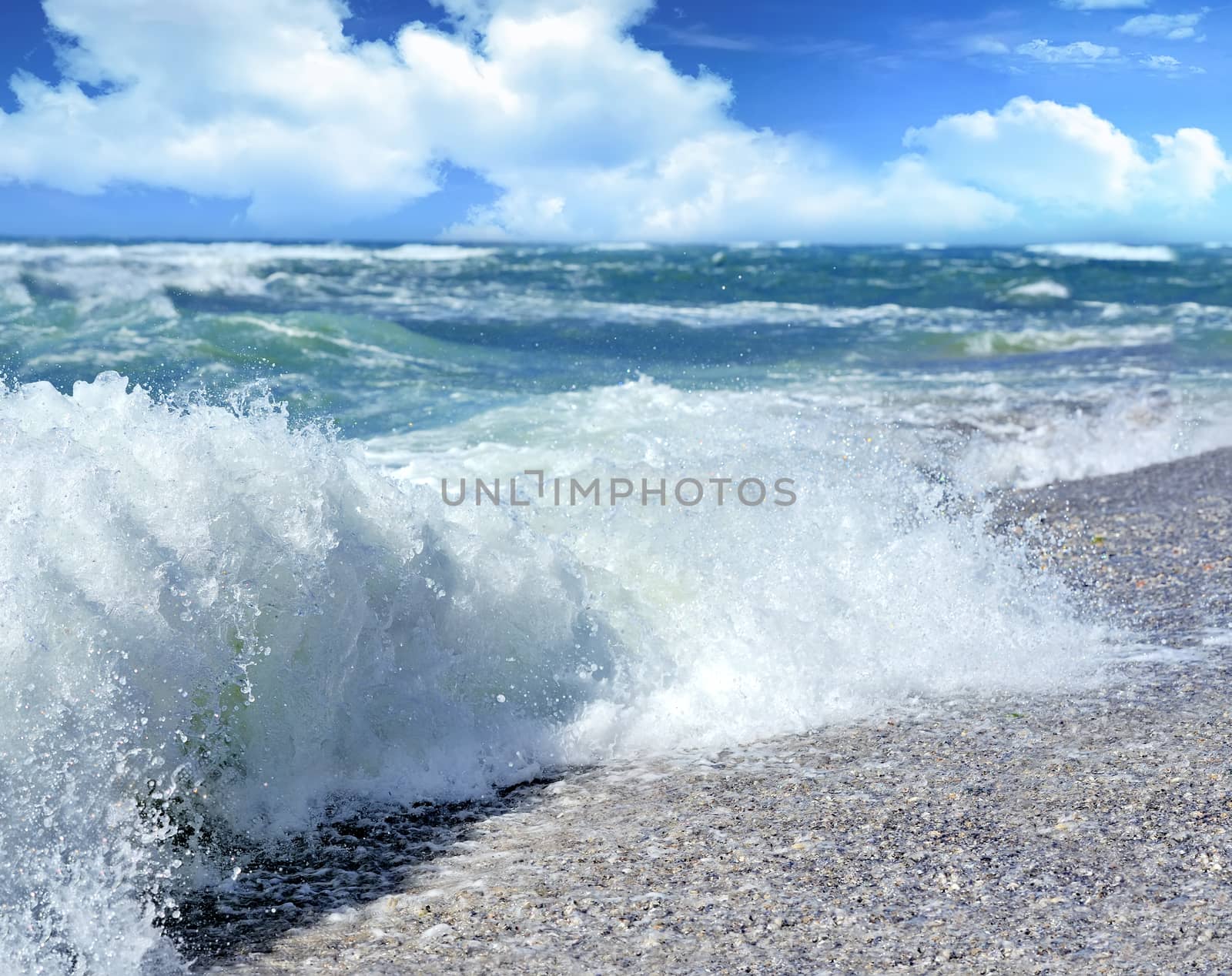 Beach Wave, view in the tube with beach in background