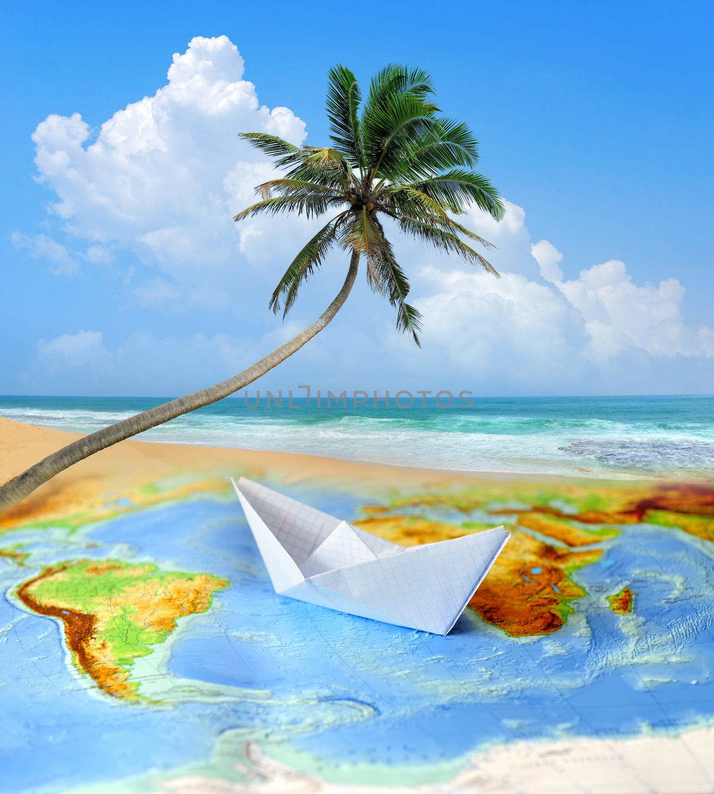 Paper boat on a background map of the world. Traveling concept