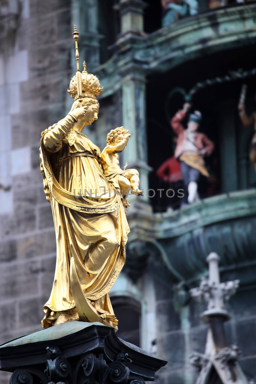 The Golden statue of Mary (Mariensaule), a Marian column on the Marienplatz in Munich, German